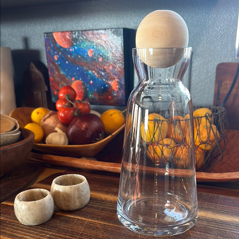 11” tall water or juice carafe… any liquid. From west elm. Never used Nice lines